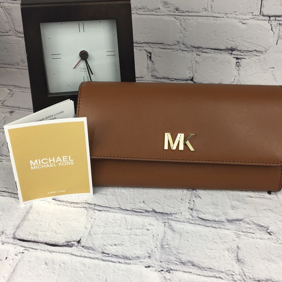 Michael Kors Handbags - Michael Kors Montgomery Brown Carryall Wallet NWOT